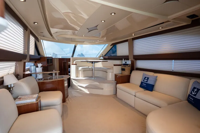 Slide: The Image of Luxurious interior of a 2009 Meridian 391 Sedan yacht with elegant seating and decor. - 22