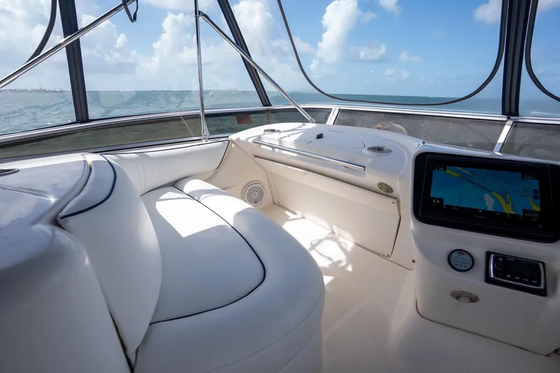 Slide: The Image of Interior view of 2009 Meridian 391 Sedan yacht with navigation system and ocean backdrop. - 31