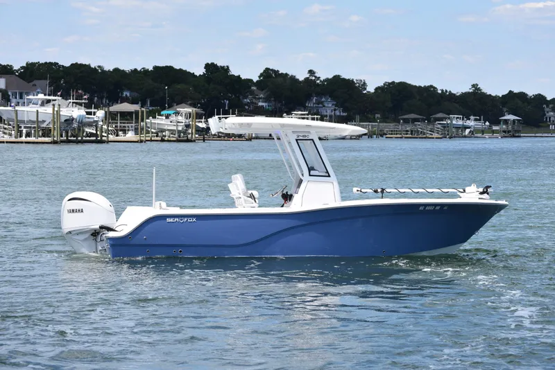 The Image of 2026 Sea Fox 248 Commander boat with Yamaha engine on calm water. - 1