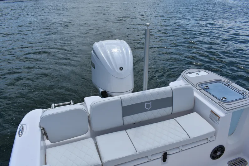 Slide: The Image of 2026 Sea Fox 248 Commander boat with Yamaha outboard motor on calm water. - 17