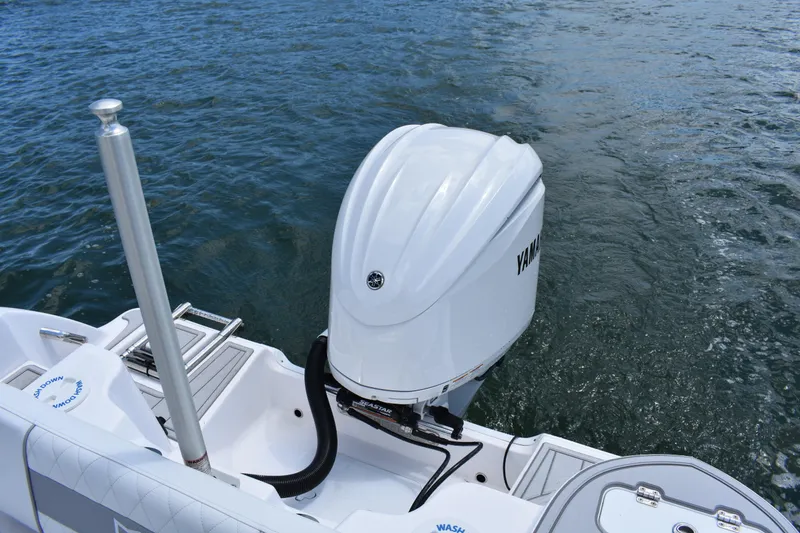Slide: The Image of 2026 Sea Fox 248 Commander boat with Yamaha outboard engine on water. - 18