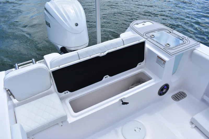 Slide: The Image of 2026 Sea Fox 248 Commander boat interior with storage and Yamaha engine. - 20