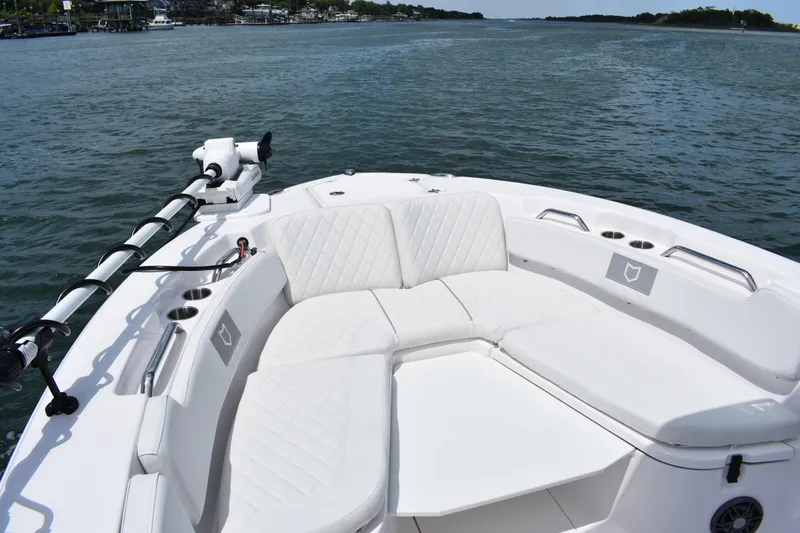 Slide: The Image of 2026 Sea Fox 248 Commander boat with spacious seating on calm waters. - 4