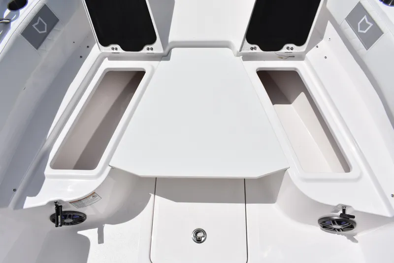 Slide: The Image of 2026 Sea Fox 248 Commander boat interior with storage compartments and sleek design. - 8