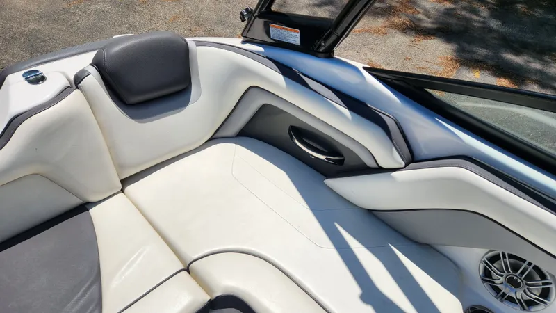 Slide: The Image of Interior of a 2016 Yamaha Boats AR192 with white upholstery. - 23