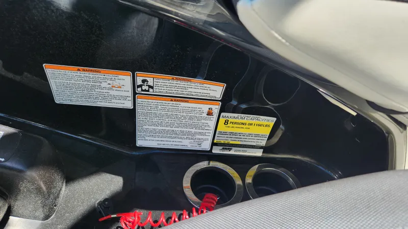 Slide: The Image of Yamaha AR192 2016 boat warning labels and capacity sticker. - 48