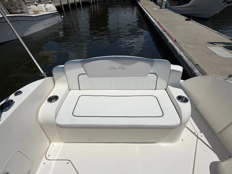 Slide: The Image of 2011 Sea Ray 240 Sundancer boat rear seat at dock. - 10