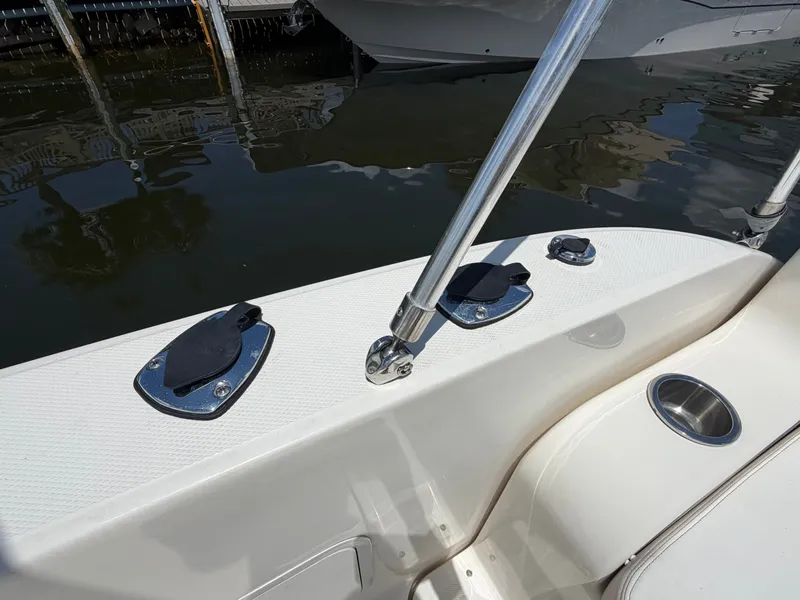 Slide: The Image of Detail view of the 2011 Sea Ray 240 Sundancer on water. - 12