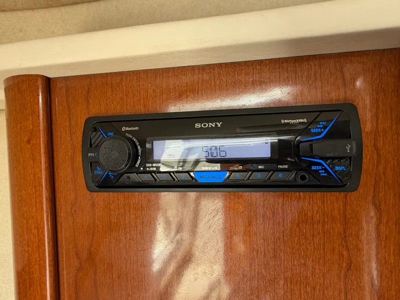 Slide: The Image of Sony car stereo in a 2011 Sea Ray 240 Sundancer. - 28