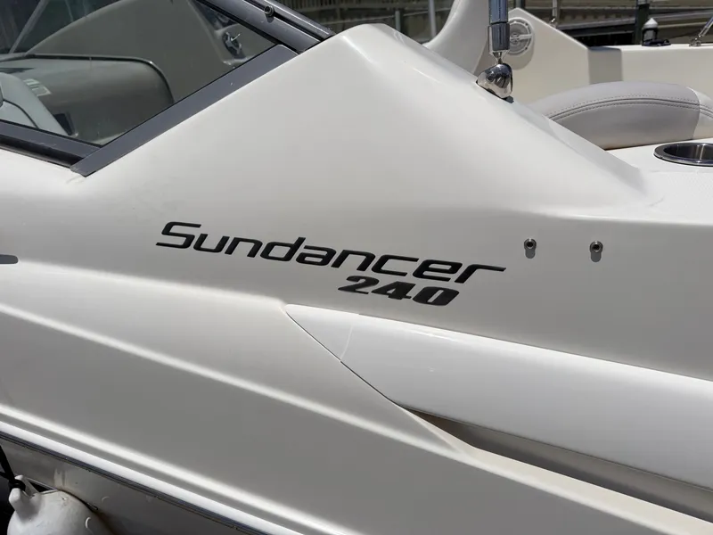 Slide: The Image of Sea Ray 240 Sundancer boat, 2011 model, side view. - 4