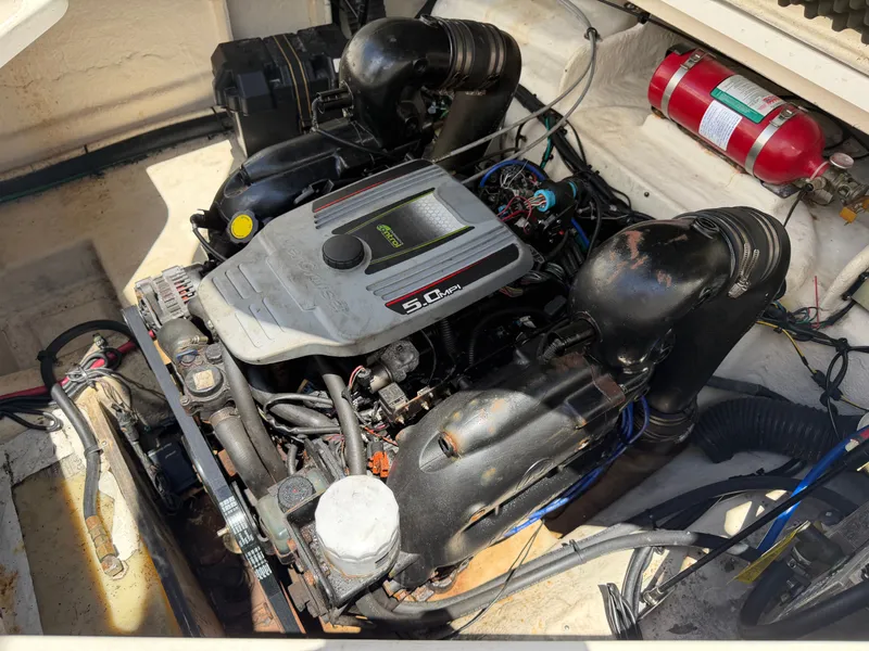 Slide: The Image of Engine compartment of a 2011 Sea Ray 240 Sundancer boat with 5.0 MPI engine. - 48