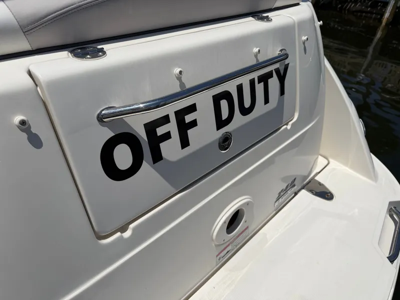 Slide: The Image of Sea Ray 240 Sundancer 2011 with "Off Duty" sign. - 6