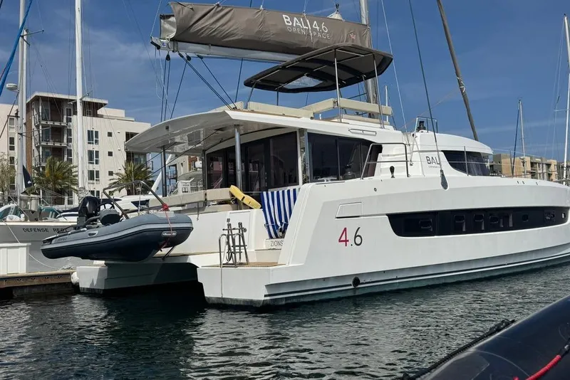 Slide: The Image of 2023 Bali 4.6 catamaran docked at marina, featuring sleek design and modern amenities. - 13