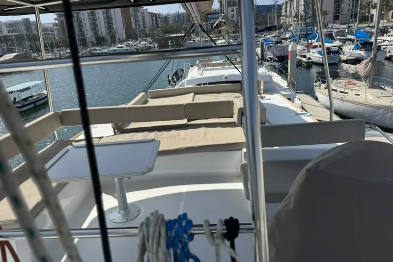 Slide: The Image of Luxurious 2023 Bali 4.6 yacht with spacious deck in a marina setting. - 34