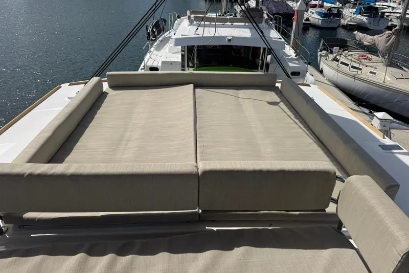 Slide: The Image of Luxurious 2023 Bali 4.6 yacht with spacious sunbathing deck at marina. - 39