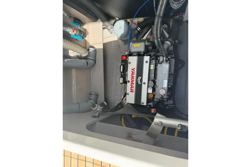 Slide: The Image of Engine compartment of a 2023 Bali 4.6 yacht featuring a Yanmar engine. - 40