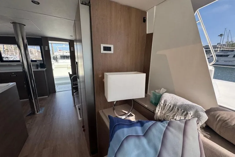 Slide: The Image of Interior of 2023 Bali 4.6 yacht with modern decor and marina view. - 54