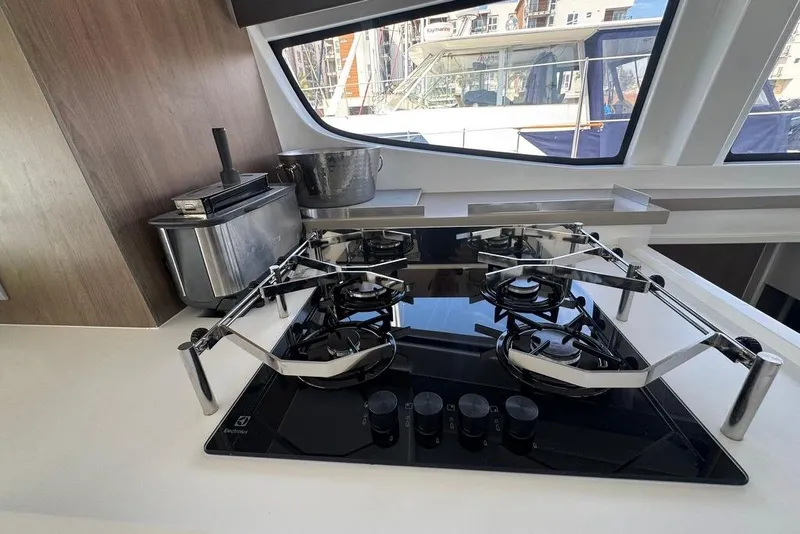 Slide: The Image of Modern kitchen on 2023 Bali 4.6 yacht with sleek stove and appliances. - 58