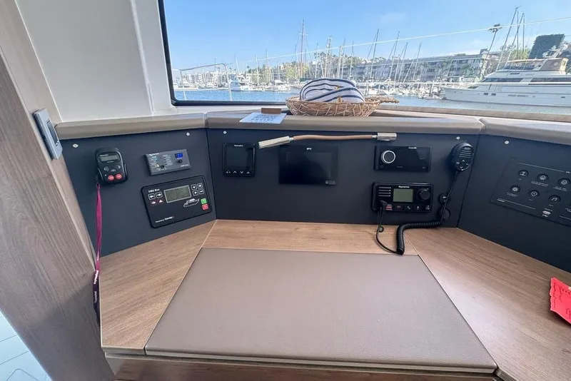 Slide: The Image of Modern control panel on a 2023 Bali 4.6 yacht, overlooking a marina. - 61