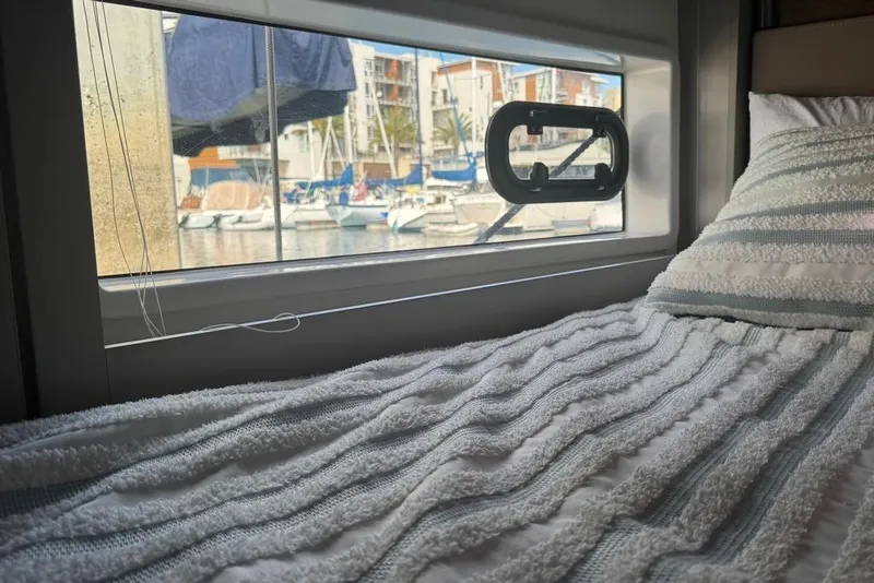 Slide: The Image of Cozy cabin interior of 2023 Bali 4.6 yacht with marina view. - 66