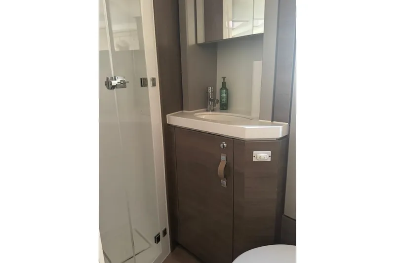 Slide: The Image of Compact bathroom in 2023 Bali 4.6 model with modern sink and shower. - 67