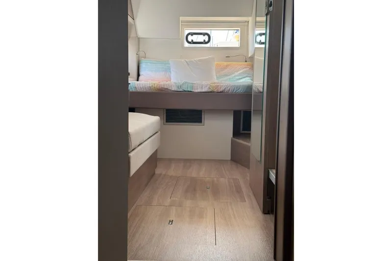 Slide: The Image of Interior cabin of 2023 Bali 4.6 yacht with bed and seating area. - 80