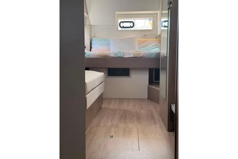 Slide: The Image of Cozy interior of 2023 Bali 4.6 yacht with bed and seating area. - 81