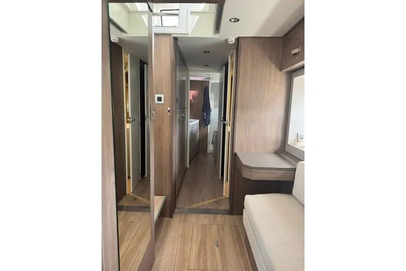 Slide: The Image of Modern interior of 2023 Bali 4.6 yacht with wood finishes and sleek design. - 83