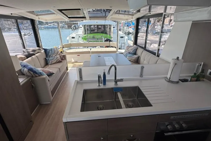 Slide: The Image of Luxurious interior of 2023 Bali 4.6 yacht with modern kitchen and spacious seating area. - 90