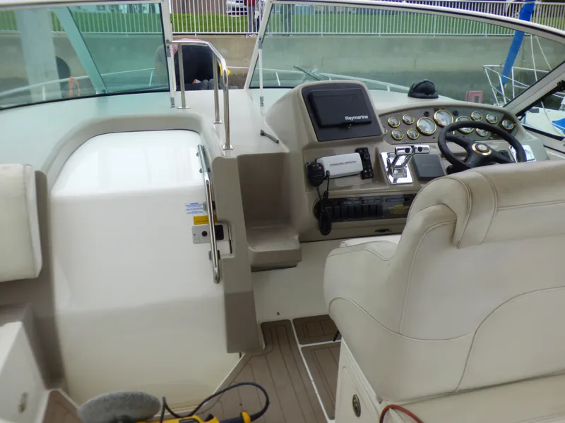 Slide: The Image of Interior view of a 2001 Cruisers Yachts 340 Express cockpit. - 10