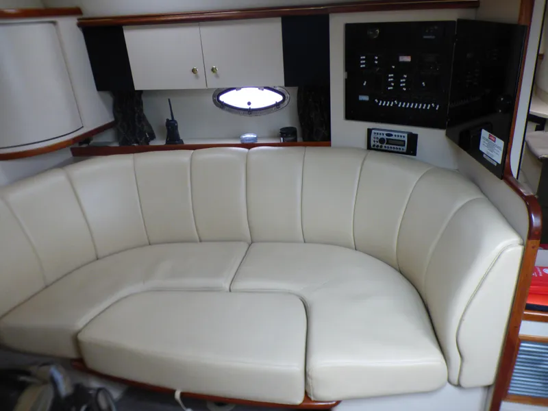Slide: The Image of Interior of 2001 Cruisers Yachts 340 Express with leather sofa. - 16