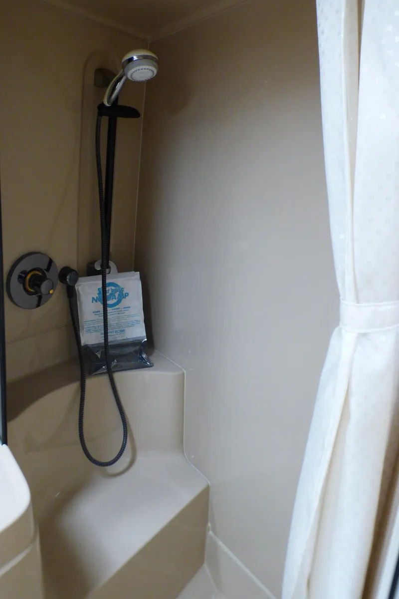Slide: The Image of Shower in 2001 Cruisers Yachts 340 Express boat. - 27