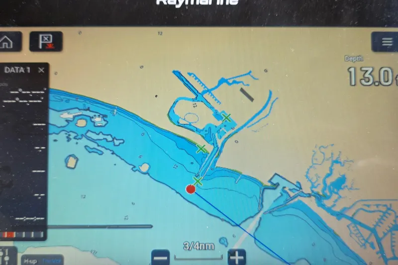 Slide: The Image of Raymarine navigation display showing nautical chart with depth reading of 13.0 feet. - 29