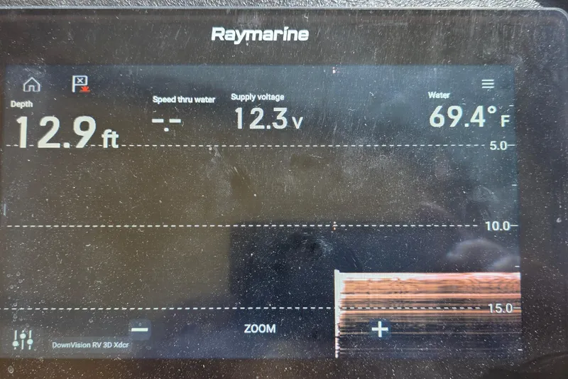 Slide: The Image of Raymarine display showing depth, voltage, and water temperature on 2001 Cruisers Yachts 340 Express. - 31