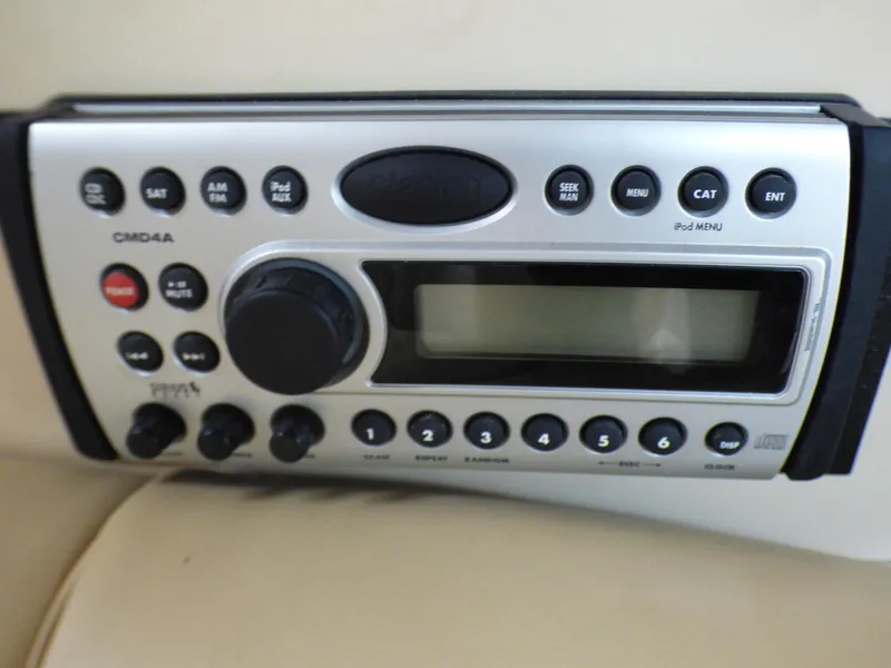 Slide: The Image of 2001 Cruisers Yachts 340 Express radio control panel. - 35