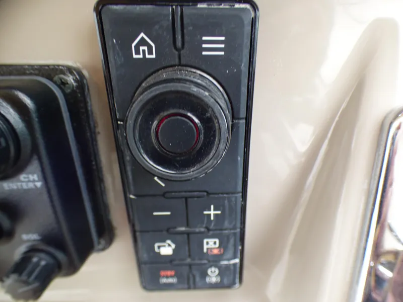 Slide: The Image of Control panel of the 2001 Cruisers Yachts 340 Express. - 39