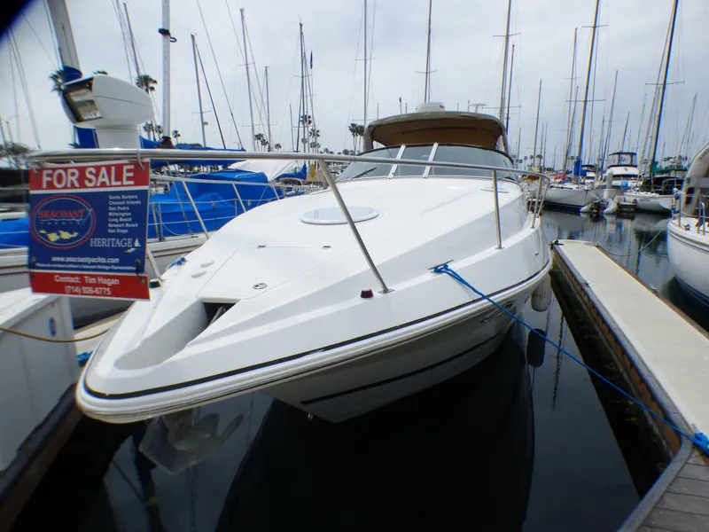 Slide: The Image of 2001 Cruisers Yachts 340 Express for sale in marina. - 4