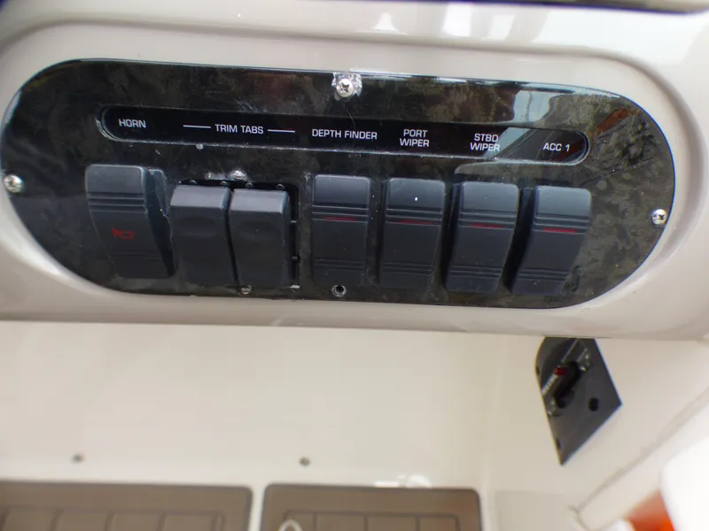 Slide: The Image of Control panel of a 2001 Cruisers Yachts 340 Express boat. - 42