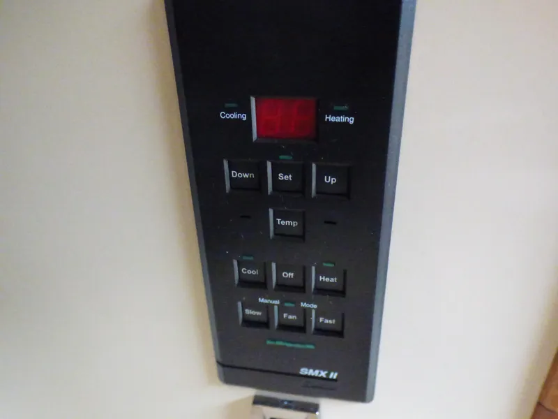 Slide: The Image of SMX II air conditioning control on 2001 Cruisers Yachts 340 Express. - 45