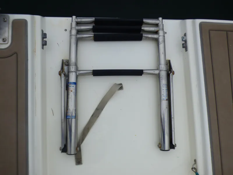 Slide: The Image of Stainless steel boat ladder on 2001 Cruisers Yachts 340 Express. - 57
