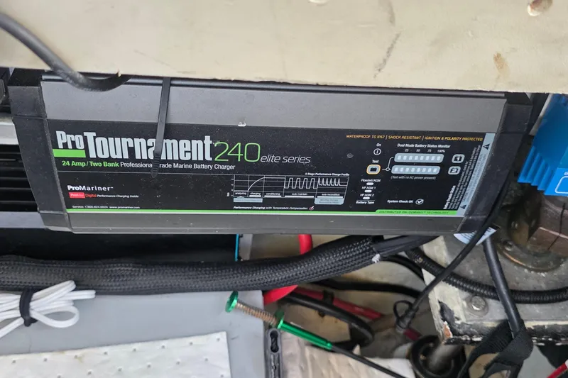 Slide: The Image of ProTournament 240 Elite marine battery charger in a 2001 Cruisers Yachts 340 Express. - 61