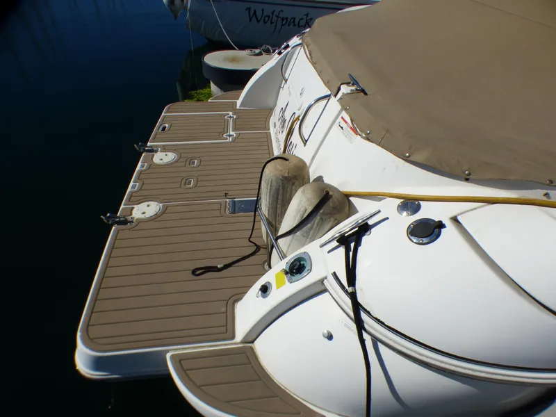 Slide: The Image of Rear view of a 2001 Cruisers Yachts 340 Express with cover. - 8