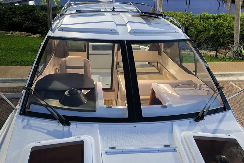 Slide: The Image of 2017 Cutwater C-24 Coupe boat with spacious interior and sleek design. - 7
