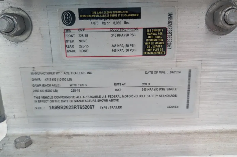 Slide: The Image of Trailer information label showing tire specifications and manufacturing details, dated April 2024. - 58
