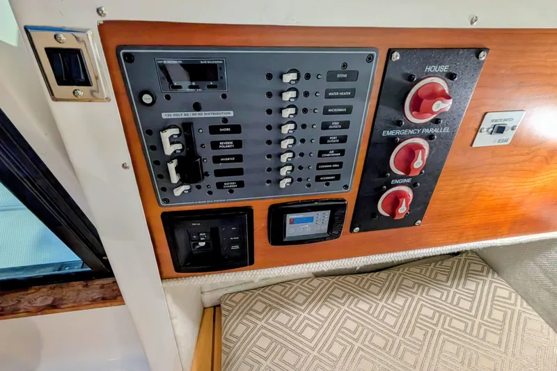 Slide: The Image of Electrical control panel of a 2017 Cutwater C-24 Coupe boat interior. - 22