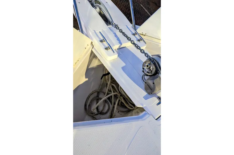 Slide: The Image of Anchor chain and ropes on a 2017 Cutwater C-24 Coupe boat deck. - 6