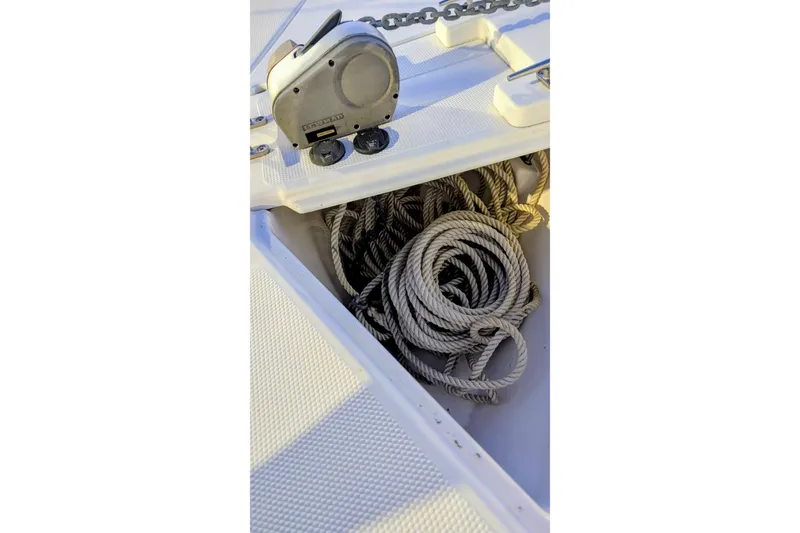 Slide: The Image of Anchor chain and rope storage on 2017 Cutwater C-24 Coupe boat deck. - 5