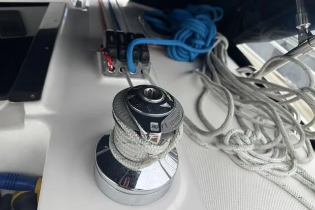 Slide: The Image of Winch and ropes on a 2007 Hunter 38 sailboat deck. - 14