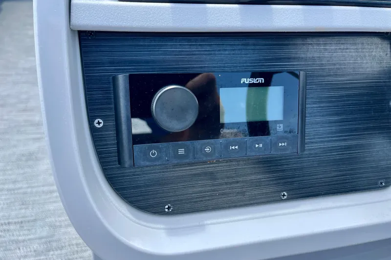 Slide: The Image of 2024 Godfrey Sweetwater 2286 SFL boat stereo system with Fusion Bluetooth controls. - 16