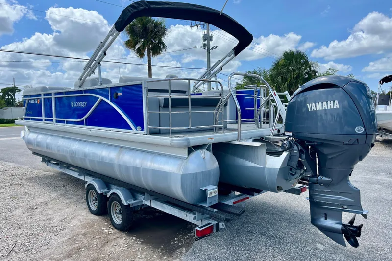 Slide: The Image of 2024 Godfrey Sweetwater 2286 SFL pontoon boat with Yamaha engine on trailer. - 5